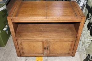 lot 22 image: Wooden Buffet Fold-out Cabinet on casters
