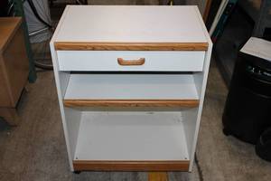 lot 31 image: White Cabinet with Drawer on Casters