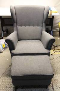 lot 1A-43 image: Grey Upholstered Wingback Chair with Ottoman