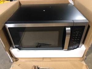 lot 10 image: Vissani 1.6 cu. ft. Countertop with Sensor Cook Microwave in Stainless Steel    Customer  Returns See Pictures