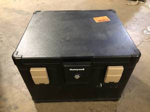 lot 18 image: Honeywell 1.06 cu. ft. Molded Fire Resistant and Waterproof Legal Document Storage Chest with Key and Double Latch Lock Keys Not Included  Customer  Returns See Pictures