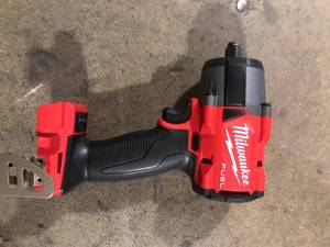 lot 33 image: Milwaukee M18 FUEL Gen-2 18V Lithium-Ion Brushless Cordless Mid Torque 12 in. Impact Wrench wFriction Ring (Tool-Only)  Customer  Returns See Pictures