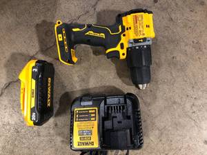 lot 48 image: DEWALT ATOMIC 20-Volt Lithium-Ion Cordless 12 in. Compact Hammer Drill with 3.0Ah Battery, Charger and Bag Customer  Returns See Pictures