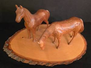 lot 56 image: Vern Johnson Hand-Carved Pair of Horses