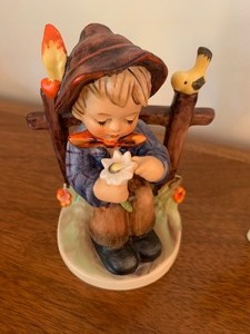 lot 100 image: Three Adorable Hummel Figurines Including Goebel Hummel Congratulations Figurine