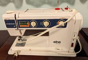 lot 21 image: Elna Air Electronic Sewing Machine and Vintage Sewing Table