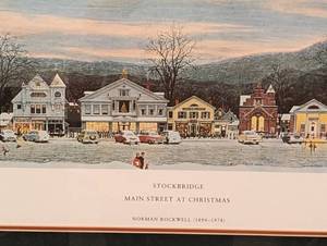 lot 92 image: Stockbridge Main Street at Christmas Print by Norman Rockwell