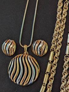 lot 243 image: Gold Tone Necklaces