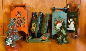 lot 290 image: Hand Painted Christmas Items Including Candle Holder, Sleighs and Trees by Vern Johnson