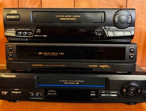 lot 291 image: Vintage VHS Players Powered Up by JVC, Panasonic and Memorex
