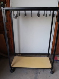 lot 98 image: CHILD SIZED ROLLING COAT RACK