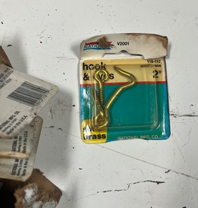 lot 41 image: 10 packs of hooks and eyes solid brass