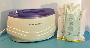 lot 182 image: REMINGTON PARAFFIN Warmer and GIGI Brand Vegetable Paraffin