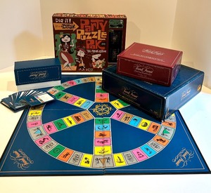 lot 194 image: TRIVIAL PURSUIT MASTER GAME GENUS Edition & Baby Boomer Subsidiary Deck, TIKI PUZZLE & Shot Glass Set