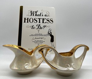 lot 554 image: WHATS A HOSTESS TO DO Book By Susan Spungen and Salt Glazed Sugar and Creamer
