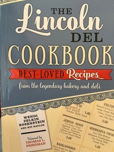 lot 556 image: The LINCOLN DEL COOKBOOK, Dry Erase Place Markers and Majesticware ONEIDA Canister