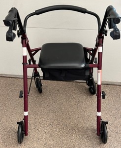 lot 546 image: Standard 4-Wheeled Rolling Walker with Seat and Storage