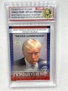 lot 54 image: Donald Trump Mugshot Trading Card MINT