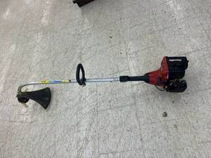 lot 212 image: Homelite Trimlite Trimmer