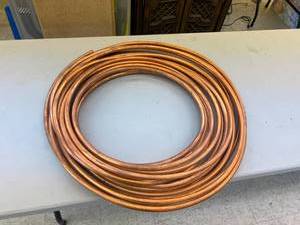 lot 228 image: 25# Roll of 12 Copper Tubing