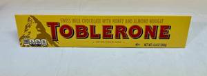 lot 97 image: 12.6oz Large Toblerone Swiss Chocolate with Honey & Almond Nougat