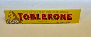 lot 98 image: 12.6oz Large Toblerone Swiss Chocolate with Honey & Almond Nougat