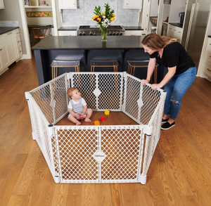 lot 69 image: Toddleroo by North States Superyard 6 Panel Free Standing Play Yard, Indoor or Outdoor Baby Playpen, Baby Gate