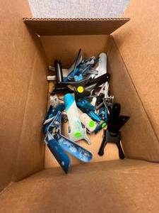 lot 10 image: Used Assorted Box of Milpore Clamps