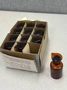 lot 67 image: 12 - Amber Glass Dropping Bottles 60ml