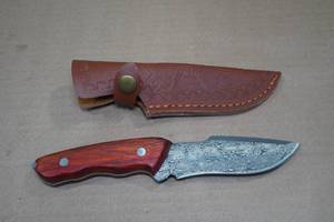 lot 14 image: Damascus Style Hunting Knife with Wood Handle