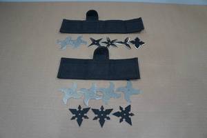 lot 24 image: 11 Kumba Ninja Throwing Stars with Cases