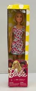 lot 52 image: Vintage Barbie White Background Floral Dress (NIB)