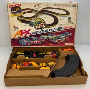 lot 151 image: Vintage Aurora AFX Race Set With Misc. Slot Car Parts In Original Box