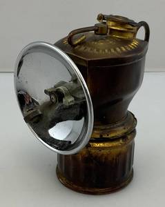 lot 179 image: Antique Early Justrite Streamlined Carbide Miners Lamp