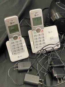 lot 24 image: Sterilite Storage Bin with Assorted Electronics and Small Appliances