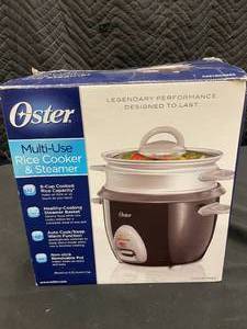 lot 29 image: Oster Multi-Use Rice Cooker & Steamer