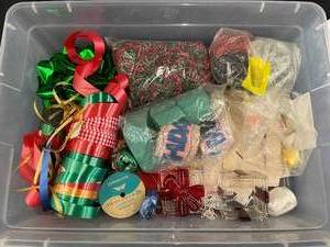 lot 37 image: Assorted Holiday Gift Wrapping Supplies in Sterilite Storage Bin