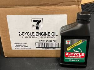 lot 38 image: Lot of 12 Bottles 7-Eleven 2-Cycle Engine Oil 8 fl oz Each