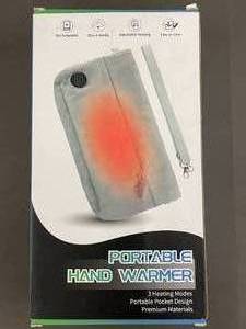 lot 64 image: Portable Hand Warmer and LOFE Memory Foam Pillow with Honeywell Winter Watchman