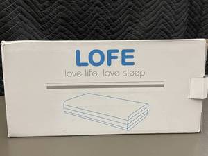 lot 65 image: LOFE Love Life, Love Sleep Memory Foam Pillow