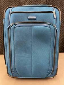 lot 79 image: Samsonite Blue Softside Rolling Luggage