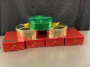 lot 89 image: Collection of Holiday-Themed Metal Storage Containers