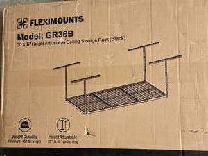 lot 102 image: Fleximounts GR36B 3x6 Height Adjustable Ceiling Storage Rack (Black)