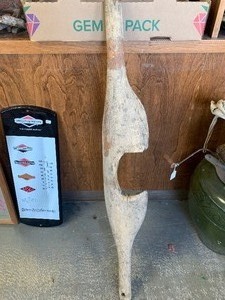 Cast iron stove parts, horse shoes, clock, more
