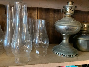 Lot of oil lamps and chimneys