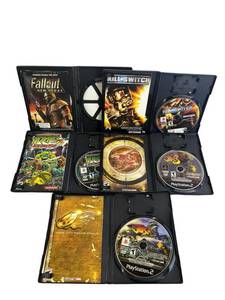 lot 5 image: Used PS2 Video Games including Jak 3, TMNT 2  Battlenexus, Kill Switch, Jak Combat Racing, and Fallout New Vegas (No Game)