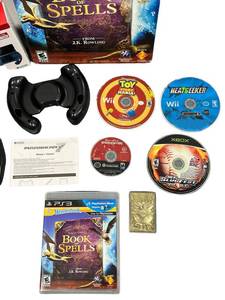 lot 52 image: Neat Video Game Lot plus Pokemon TOGEPI 23 Karat Gold Plated Trading Card and Nintendo 3DS Mario Cart 7 Wheel