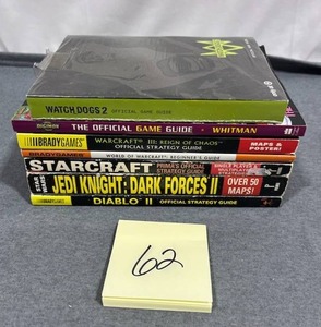 lot 62 image: Video Game Guide Lot including (New Sealed) Watch Dogs 2 Official Game Guide