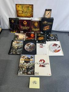 lot 76 image: T PC Video Game Lot - Guild Wars 2, Warhammer Online, and Lord of the Rings