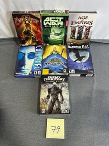 lot 79 image: T PC Video Game Lot including Everquest 2, Act of War, Age of Empires, Cold Zero, Age of Wonders Shadow Magic, Barrow Hill, and Enemy Territory Quake Wars